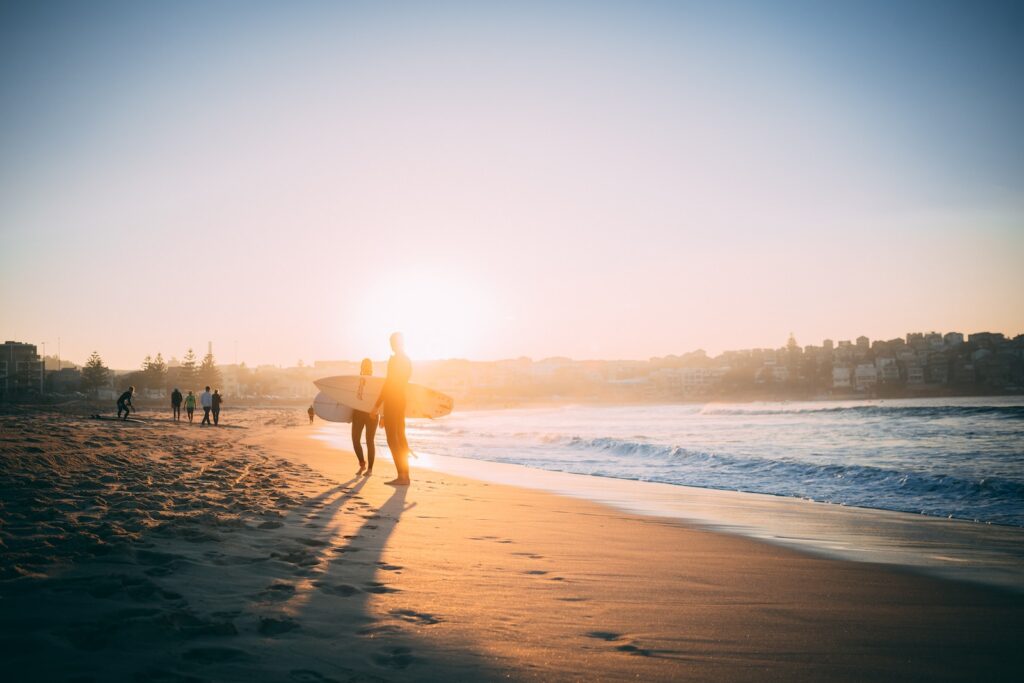 group of people on seashore during daytime